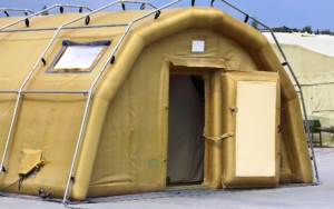 Inflatable military tent with front door open